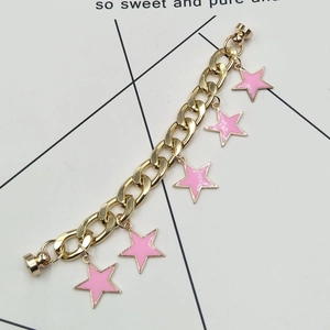 Gold chunky chain charm bracelet with pink star pendants and magnetic clasp closure