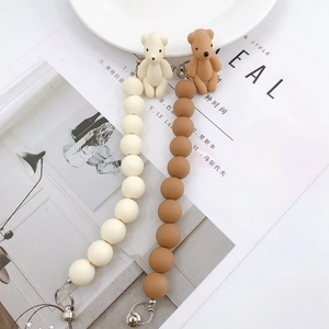 Cute acrylic bear phone charms in cream and brown with beaded strap and metal ring