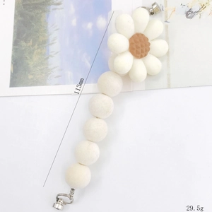 White acrylic flocked flower keychain charm with white petals and rotating metal hook