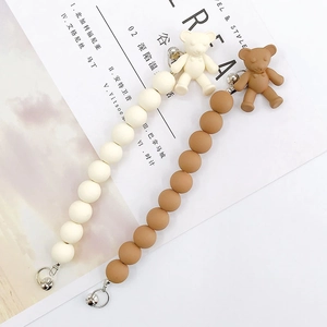 Pendentifs ours mats minimalistes en crème et marron avec clochettes et anneaux en métal