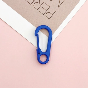 Close-up of candy blue multifunctional spring lobster clasp with light plastic design