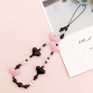 Handmade phone strap with black and pink acrylic hearts and baroque style pearls