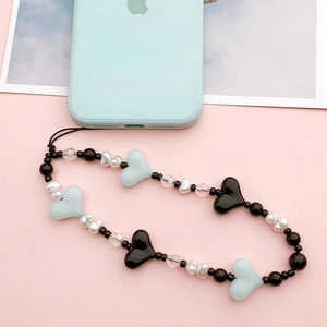 Handmade beaded phone strap with acrylic hearts, pearls, and glass beads in blue and black