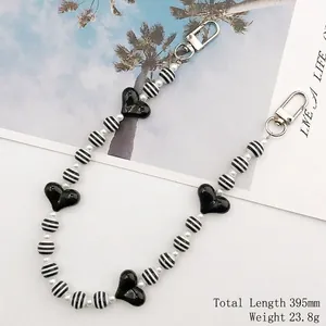 Acrylic heart and striped beaded strap with lobster clasps for bags and phones, 395mm length