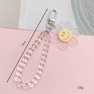 Beaded clear floral phone charm with smiley face center and silver lobster clasp