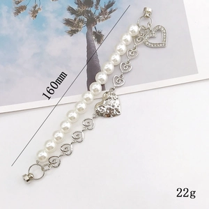 Dual-strand pearl and silver heart charm bracelet, 160mm length, 22g jewelry piece