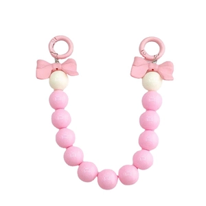 Dragonne en perles roses et beige avec nœuds mignons et fermoir rond à ressort