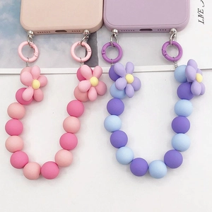 Dragonne de téléphone en perles et fleurs acryliques en dégradé rose et violet