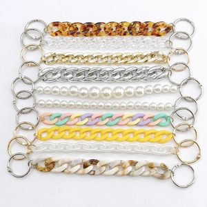 Assorted decorative shoe charms with pearls, acrylic chains and metal lobster clasps