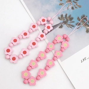 Pink floral wooden bead mobile phone charm with polka dot pattern handmade accessory