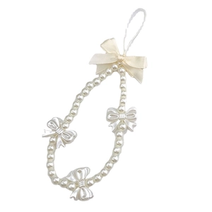 Sweet pearl phone strap featuring satin ribbon and resin bow accents for women