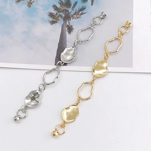Modern metallic irregular link bracelets in gold and silver with magnetic clasps