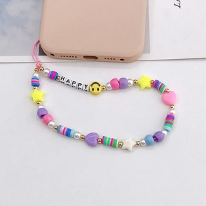 Detail of DIY handmade phone charm with colorful beads, HAPPY letters and star shapes