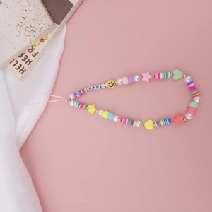 Handmade beaded phone charm with HAPPY letter beads, yellow smileys and colorful stars