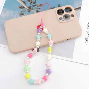 Handmade beaded phone charm with pastel star resin beads and pearls on a sleek phone case