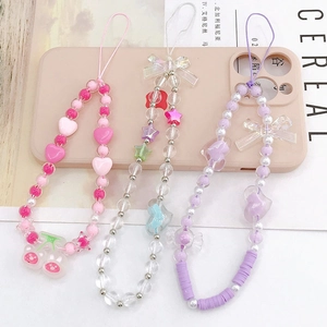 Three beaded acrylic heart phone charms in pink, purple, and transparent styles
