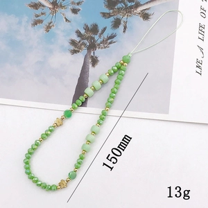 Handmade beaded phone charm with green crystal beads and gold flower accents, 150mm length