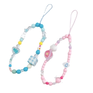 Handmade beaded phone charms with blue and pink heart-shaped beads and checkered patterns