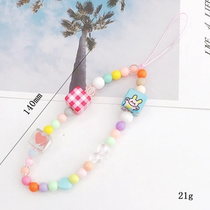 Beaded cell phone charm with cartoon rabbit and heart beads in a colorful 140mm design