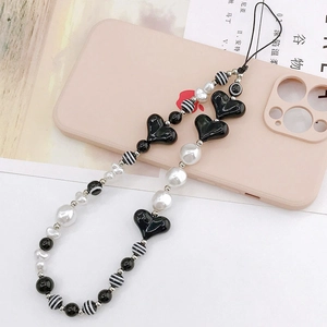 Beaded heart phone lanyard charm with black and white striped beads for accessories