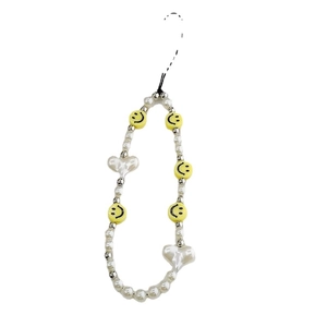 Chic phone strap with white pearls, yellow smiley faces, and heart beads on a black cord