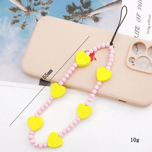 Handmade pink beaded phone wrist strap with yellow wooden hearts for women's case