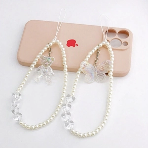 Charming pearl beaded phone wrist strap with iridescent bear and butterfly charms