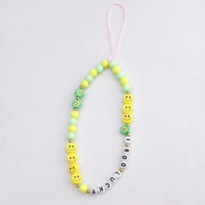 Colorful acrylic beaded phone charm featuring yellow smiley faces and lucky letter beads