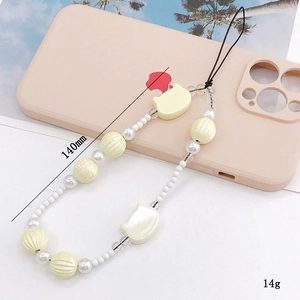 Beaded phone charm with pearlescent cat motifs and cream yellow striped round beads