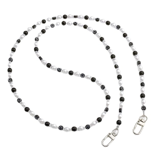 Handmade beaded crossbody phone chain with smiley face beads and silver lobster clasps