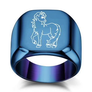 Detailed macro shot of blue gradient signet ring with laser engraved horse motif