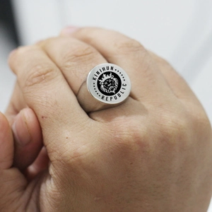 Men's titanium steel signet ring with lion king crown engraving in silver and black finish