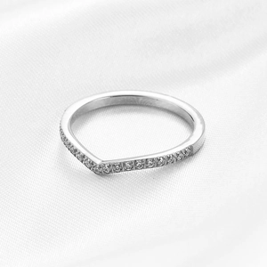 Detail of a 2mm silver V-shaped stainless steel ring with pavé-set shimmering zircons