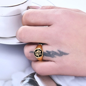 18K gold plated stainless steel signet ring with black koi fish pattern on model hand