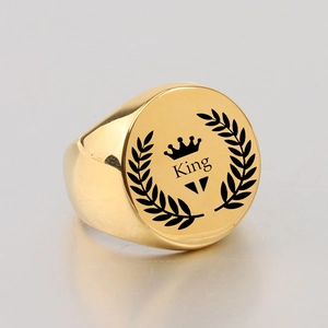 Gold-plated stainless steel seal ring featuring a crown and King engraving with laurel leaves