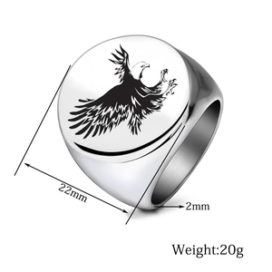 Macro view of 22mm stainless steel signet ring featuring a detailed eagle engraving