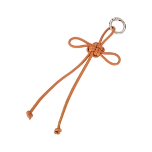 Handmade woven cognac leather lucky knot bag charm with a silver spring metal ring