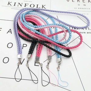 Detail of woven lanyard collection in purple pink blue black and rose red with metal clasps