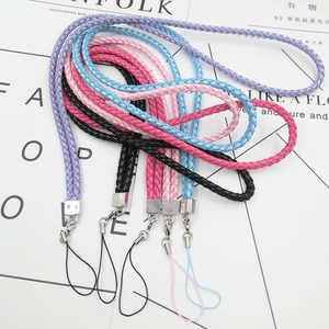 Detailed view of colorful braided lanyards with silver lobster clasps and cord loops