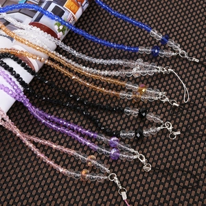 Detail view of colorful crystal bead phone lanyards with metal lobster clasps