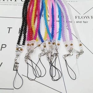 Detailed view of colorful beaded phone lanyards with crystal beads and lobster clasps