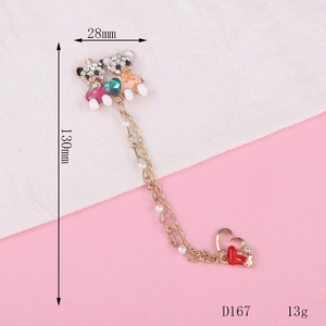 Detail view of crystal bear pendant with pearls and red heart, dimensions 28mm by 130mm