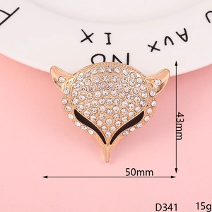 Detailed macro view of diamond-encrusted fox charm with size and weight specs