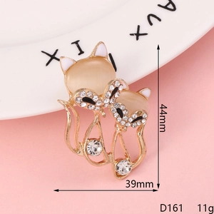 Golden alloy fox brooch with cat eye stones and sparkling rhinestones 44mm size