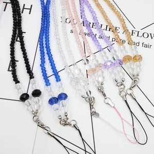 Close-up of crystal beaded phone lanyards in various colors with metal lobster clasps