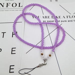 Detail of purple beaded phone lanyard with crystal accents and silver lobster clasp
