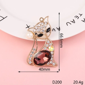 Detail view of fox pendant with purple gemstone, white rhinestones and size dimensions