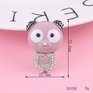 Detail view of a purple rhinestone bear pendant with star gem, 32.6mm height size