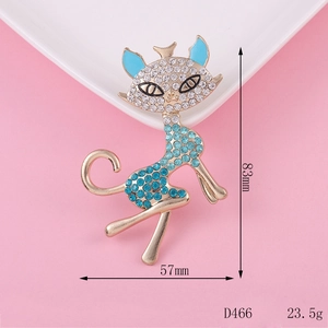 Detail showing dimensions of cat brooch with blue rhinestones and gold plating