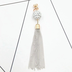 Detail of long tassel pendant with gold ring and white rhinestone ball for DIY phone case